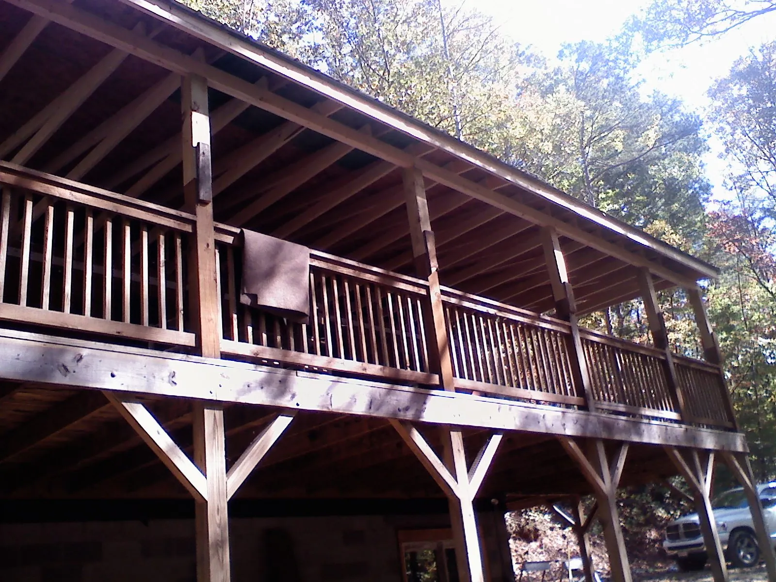 Timber framing under a new elevated porch and deck — Roof Leak Repair in Kinston by Roofing Brothers